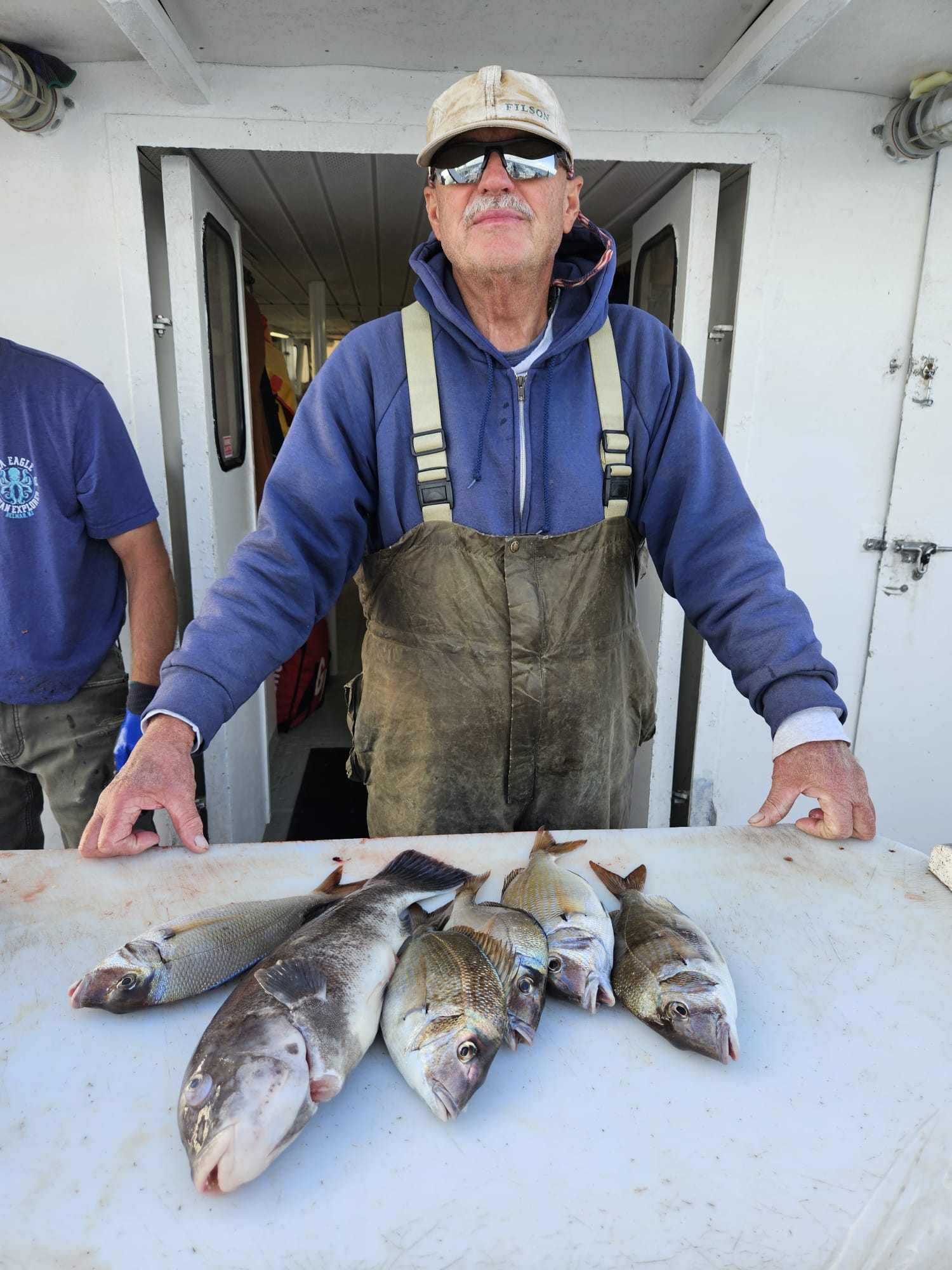 a man holding a fish